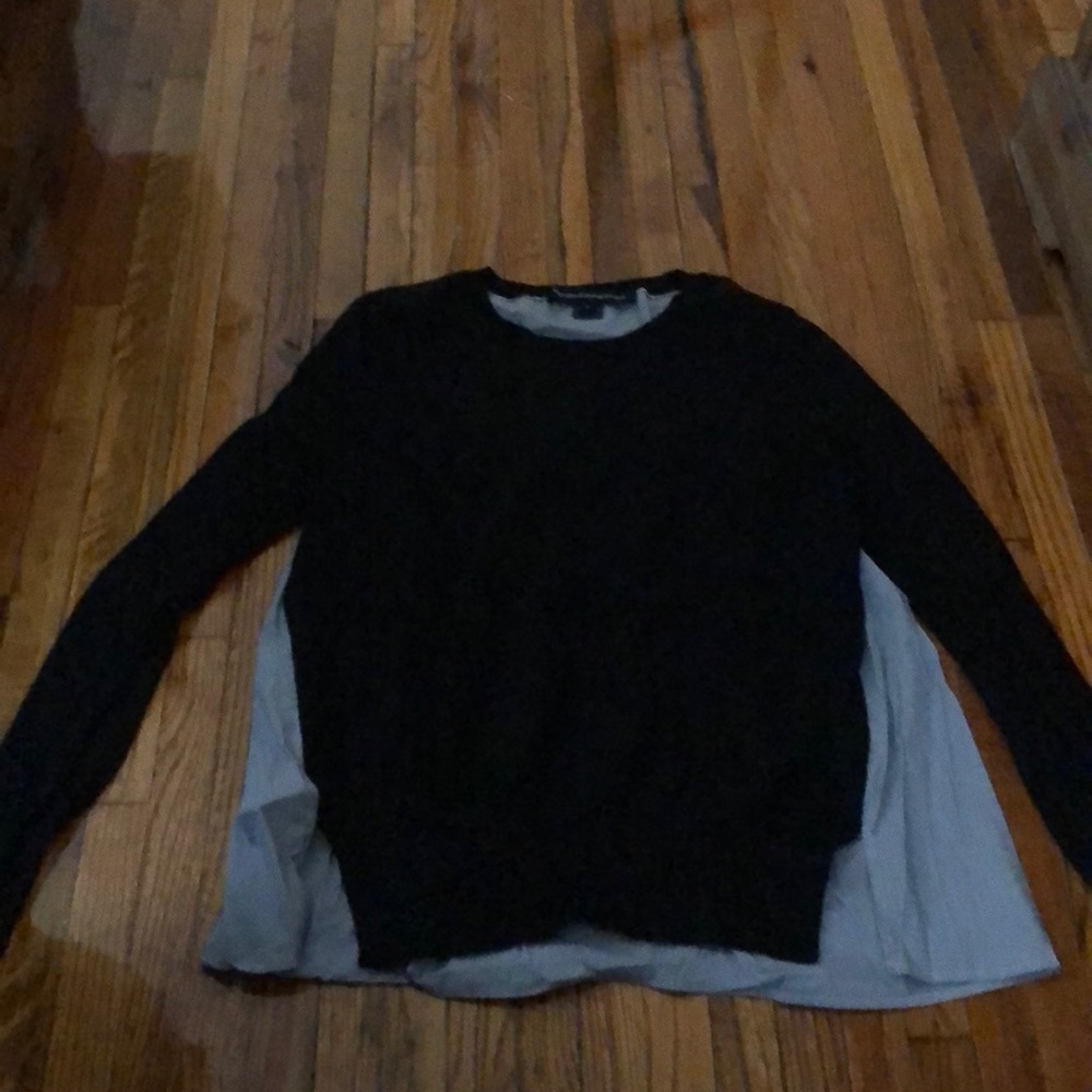 Black sweater with striped blouse detailing